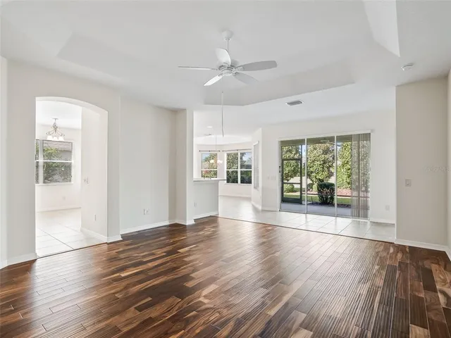 a bedroom with a large bed and a couch