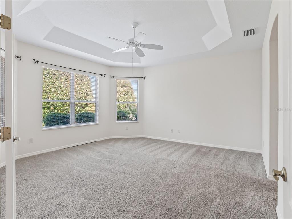 3229 Killington Loop The Villages, FL 32163 - Photo 17 of 44 a view of an empty room with a window