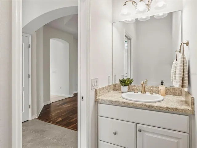 a workspace with furniture window and wooden floor