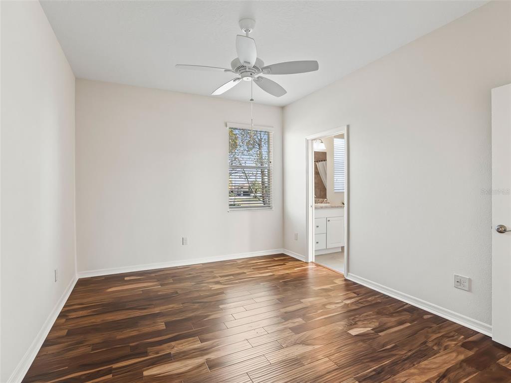 3229 Killington Loop The Villages, FL 32163 - Photo 32 of 44 wooden floor in an empty room