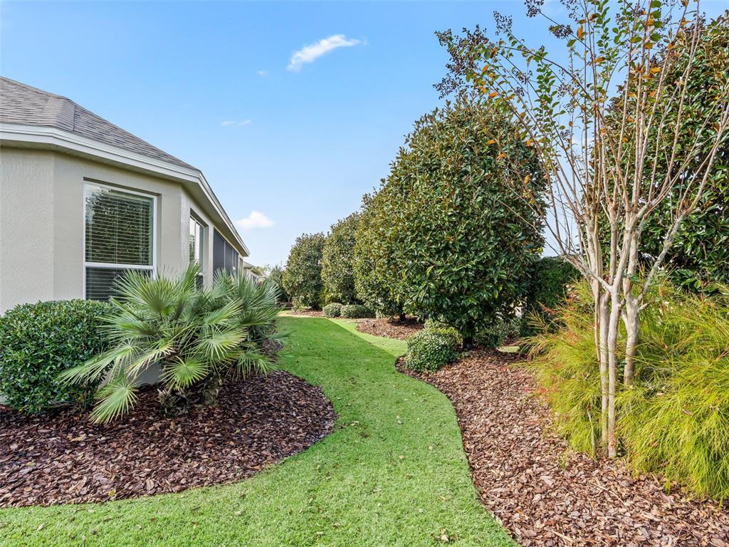 3229 Killington Loop The Villages, FL 32163 - Photo 41 of 44 a front view of a house with a yard