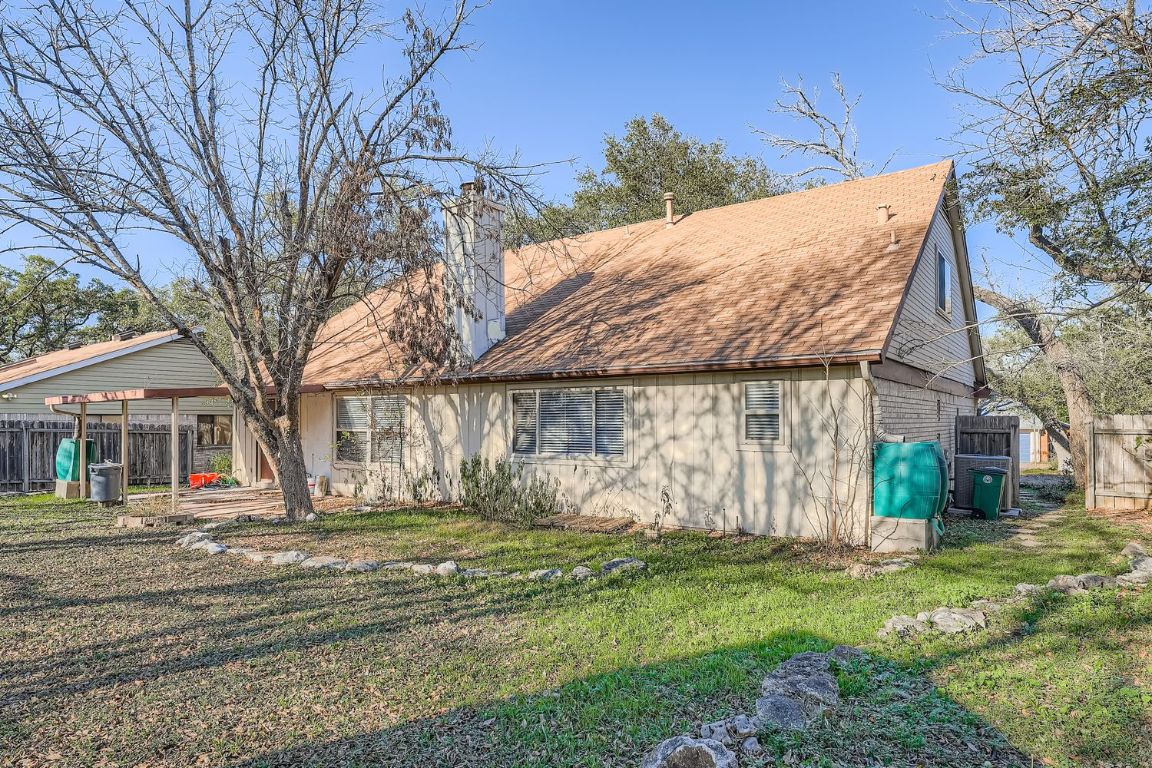 1415 Lance Way Austin, TX 78758 - Photo 29 of 29 a view of a house with a yard