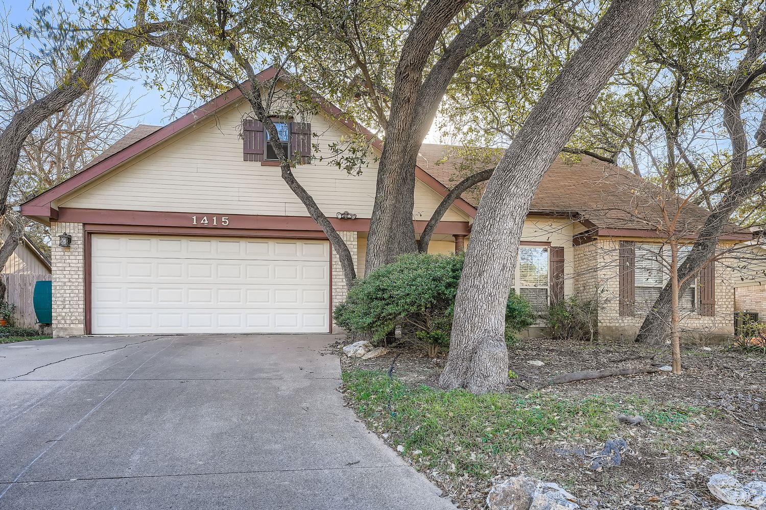 1415 Lance Way Austin, TX 78758 - Photo 3 of 29 a front view of house with small garden