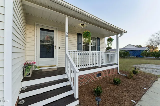 a view of a house with a porch