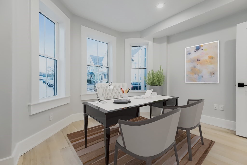 13 McKone Street, Unit 1 Boston, MA 02122 - Photo 15 of 36 a view of a dining room with furniture window and wooden floor