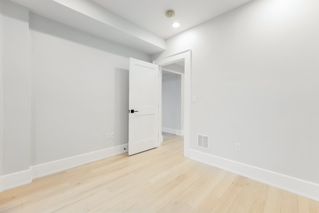 13 McKone Street, Unit 1 Boston, MA 02122 - Photo 17 of 36 a view of an empty room