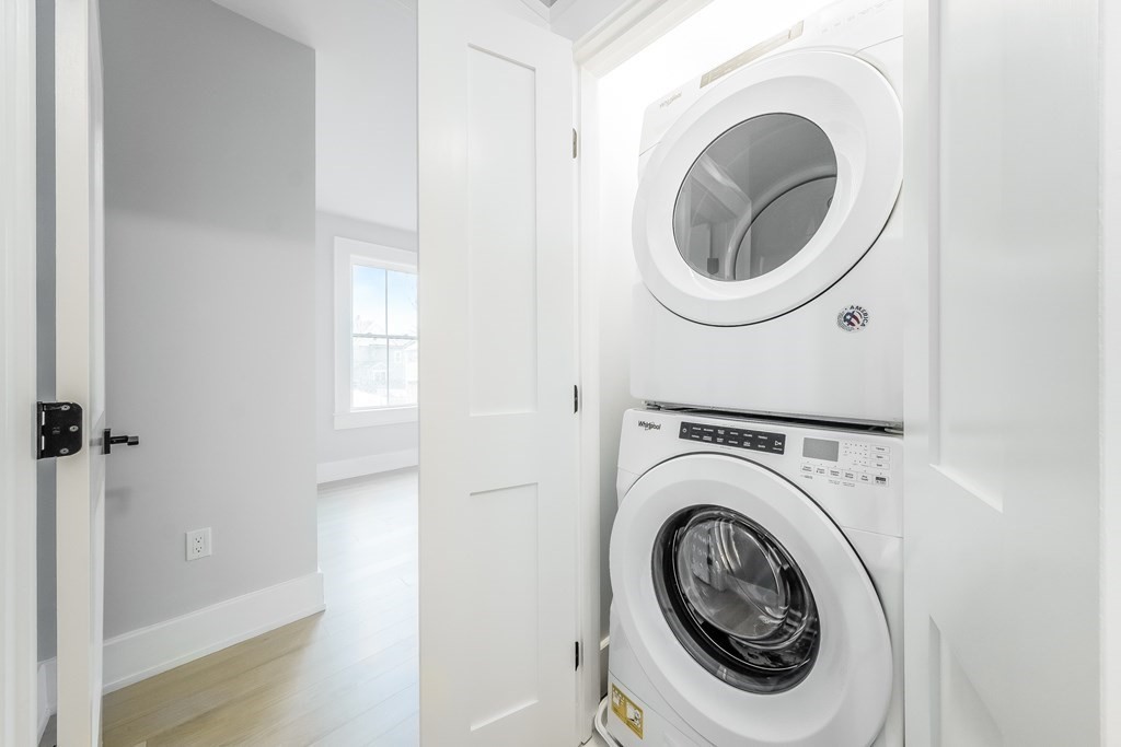 13 McKone Street, Unit 1 Boston, MA 02122 - Photo 28 of 36 a utility room with dryer and washer
