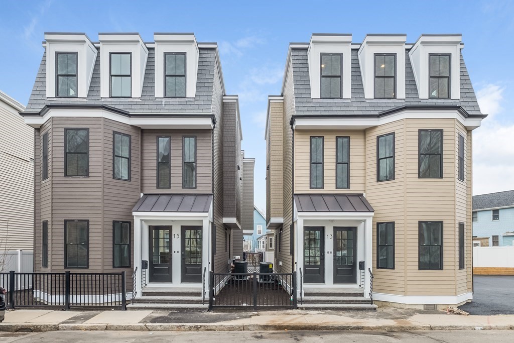 13 McKone Street, Unit 1 Boston, MA 02122 - Photo 31 of 36 a front view of residential houses