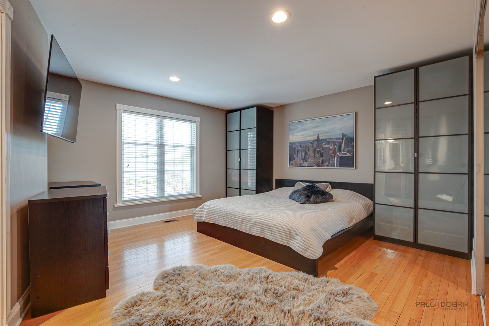 2016 Seneca Lane Mount Prospect, IL 60056 - Photo 11 of 33 a bedroom with a bed and wooden floor