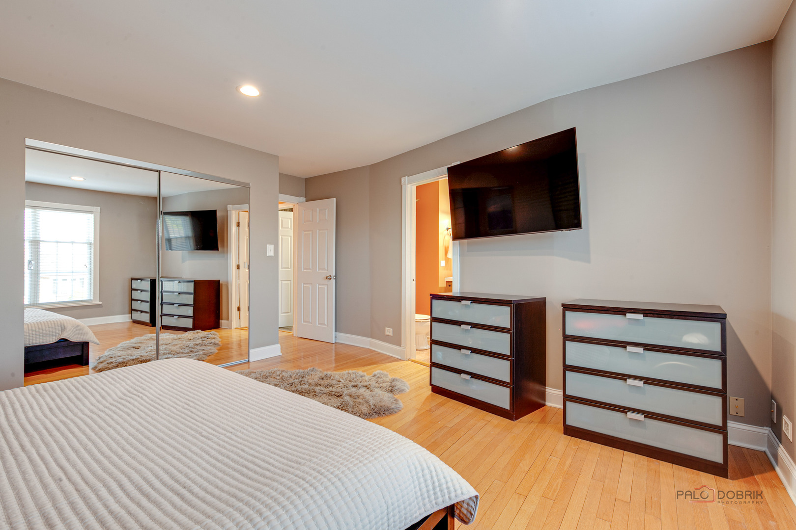 2016 Seneca Lane Mount Prospect, IL 60056 - Photo 12 of 33 a bedroom with furniture and a flat screen tv