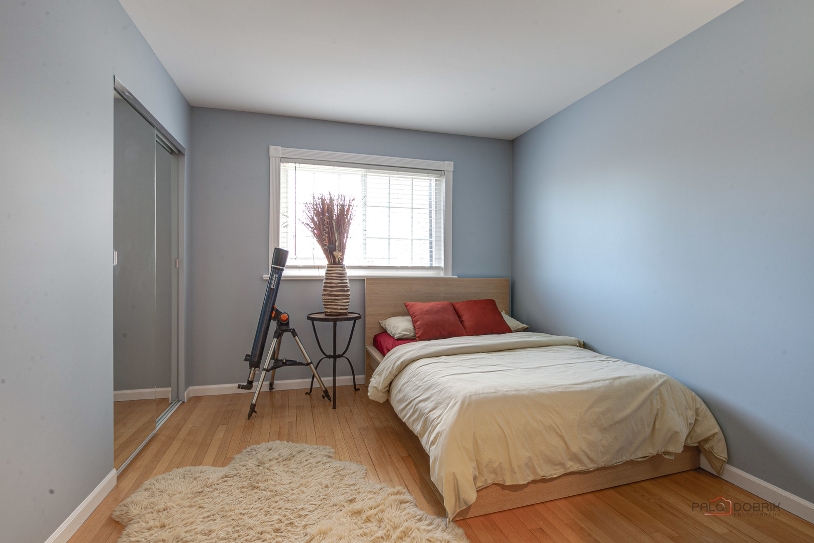 2016 Seneca Lane Mount Prospect, IL 60056 - Photo 16 of 33 a bed sitting in a bedroom next to a window