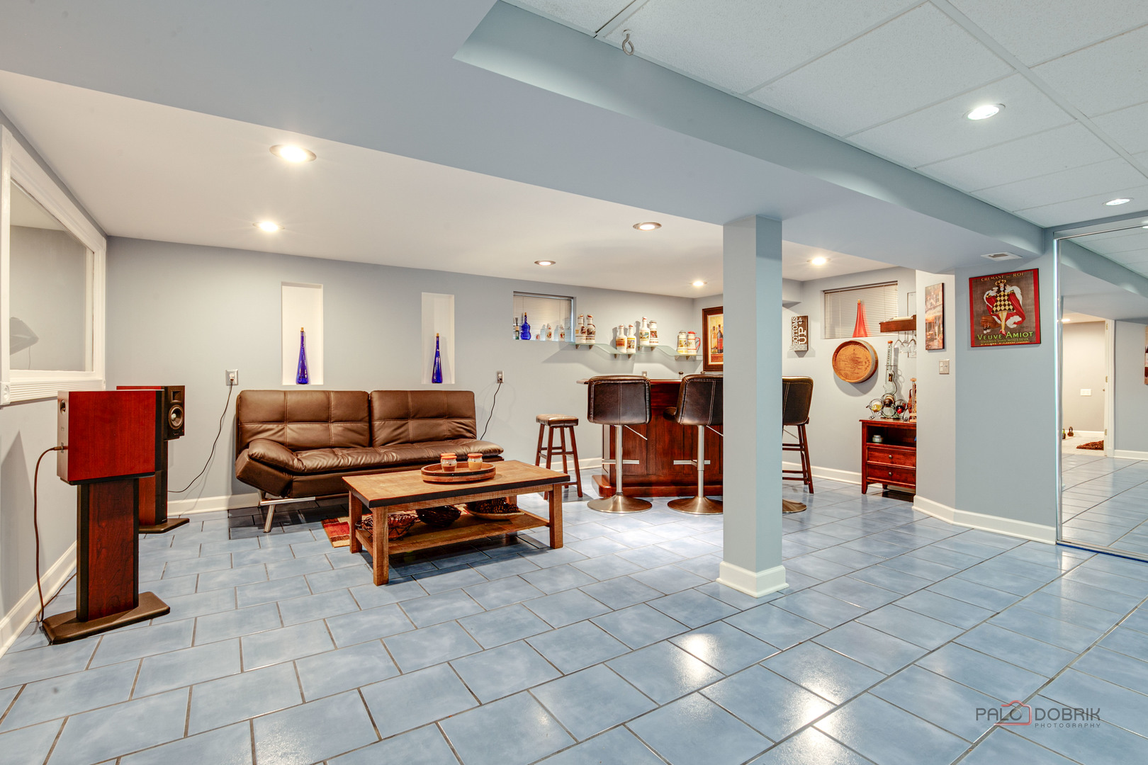 2016 Seneca Lane Mount Prospect, IL 60056 - Photo 24 of 33 a living room with lots of furniture and a flat screen tv