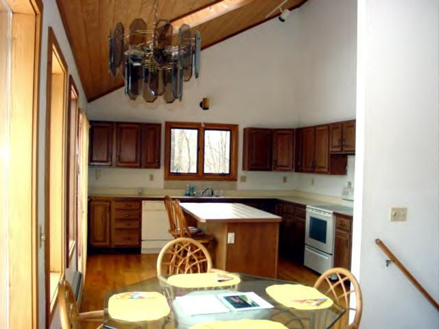 47 Dean Hill Road Richmond, MA 01254 - Photo 2 of 7 a kitchen with a sink and cabinets