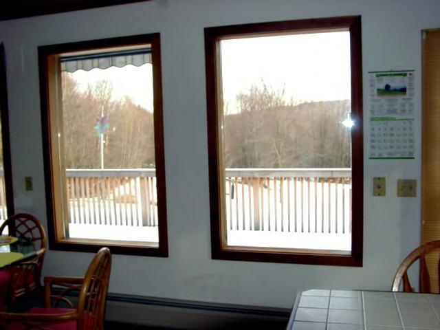 47 Dean Hill Road Richmond, MA 01254 - Photo 6 of 7 a view of a room and dining room and a window