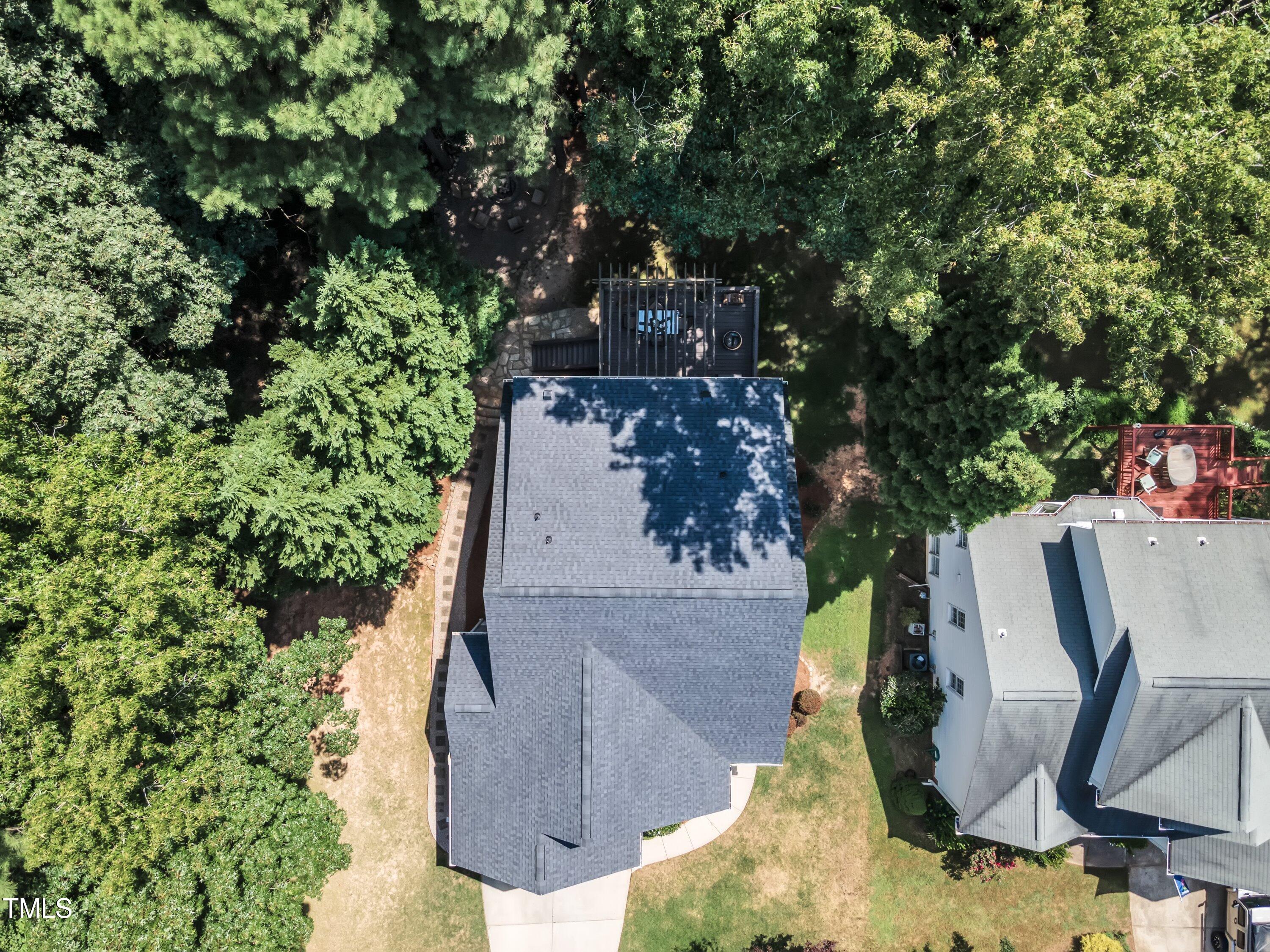 6323 Cedar Waters Drive Raleigh, NC 27607 - Photo 73 of 84 an aerial view of a house with garden space and sitting area