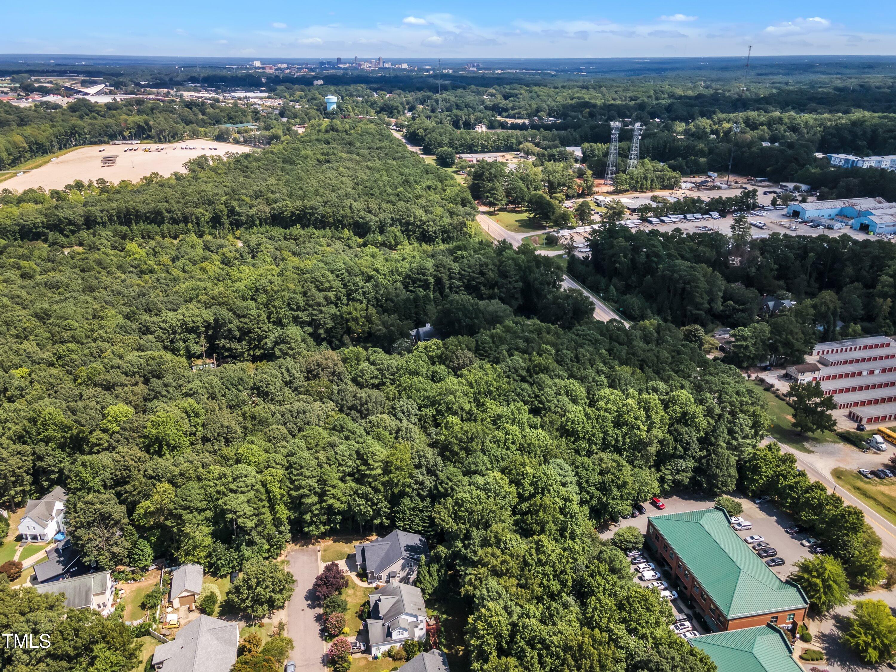 6323 Cedar Waters Drive Raleigh, NC 27607 - Photo 81 of 84 an aerial view of a residential houses and city view