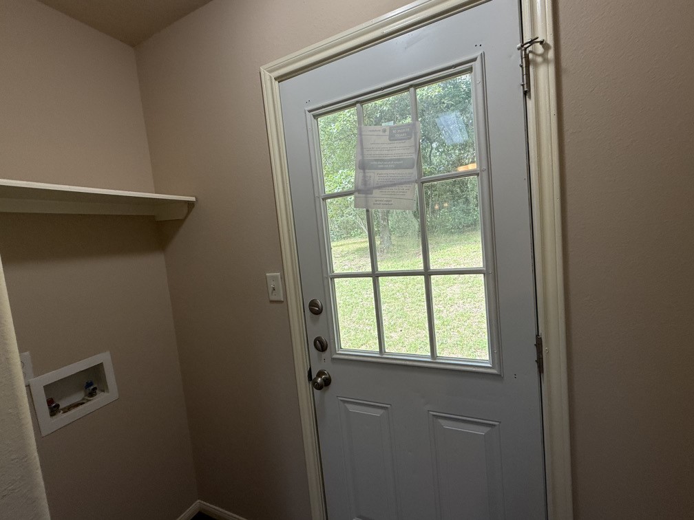 12595 Royal Springs Road Conroe, TX 77303 - Photo 5 of 26 a view of a small space with a window