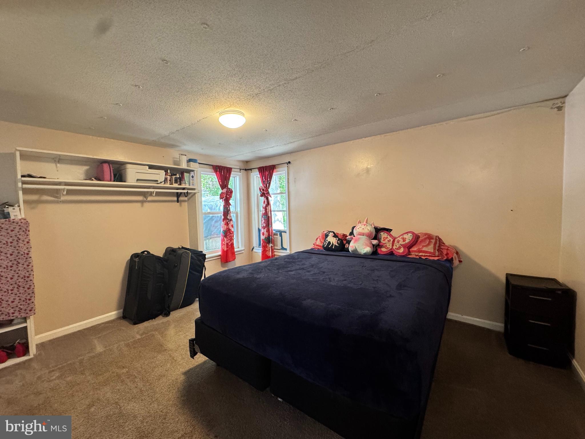 229 Sand Castle Boulevard Fruitland, MD 21826 - Photo 14 of 27 a room with a bed and cabinets