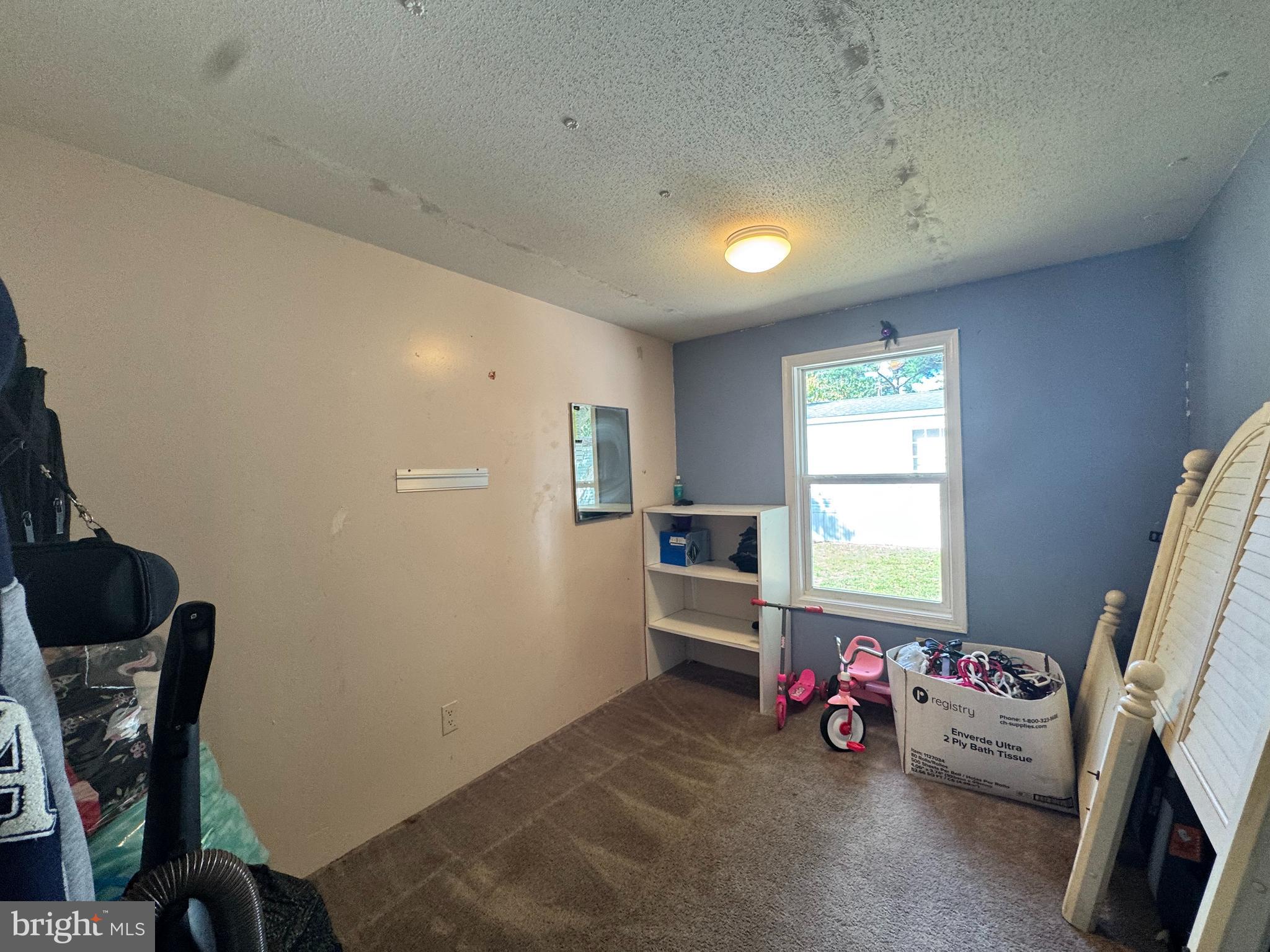 229 Sand Castle Boulevard Fruitland, MD 21826 - Photo 19 of 27 a view of a room with furniture and a window