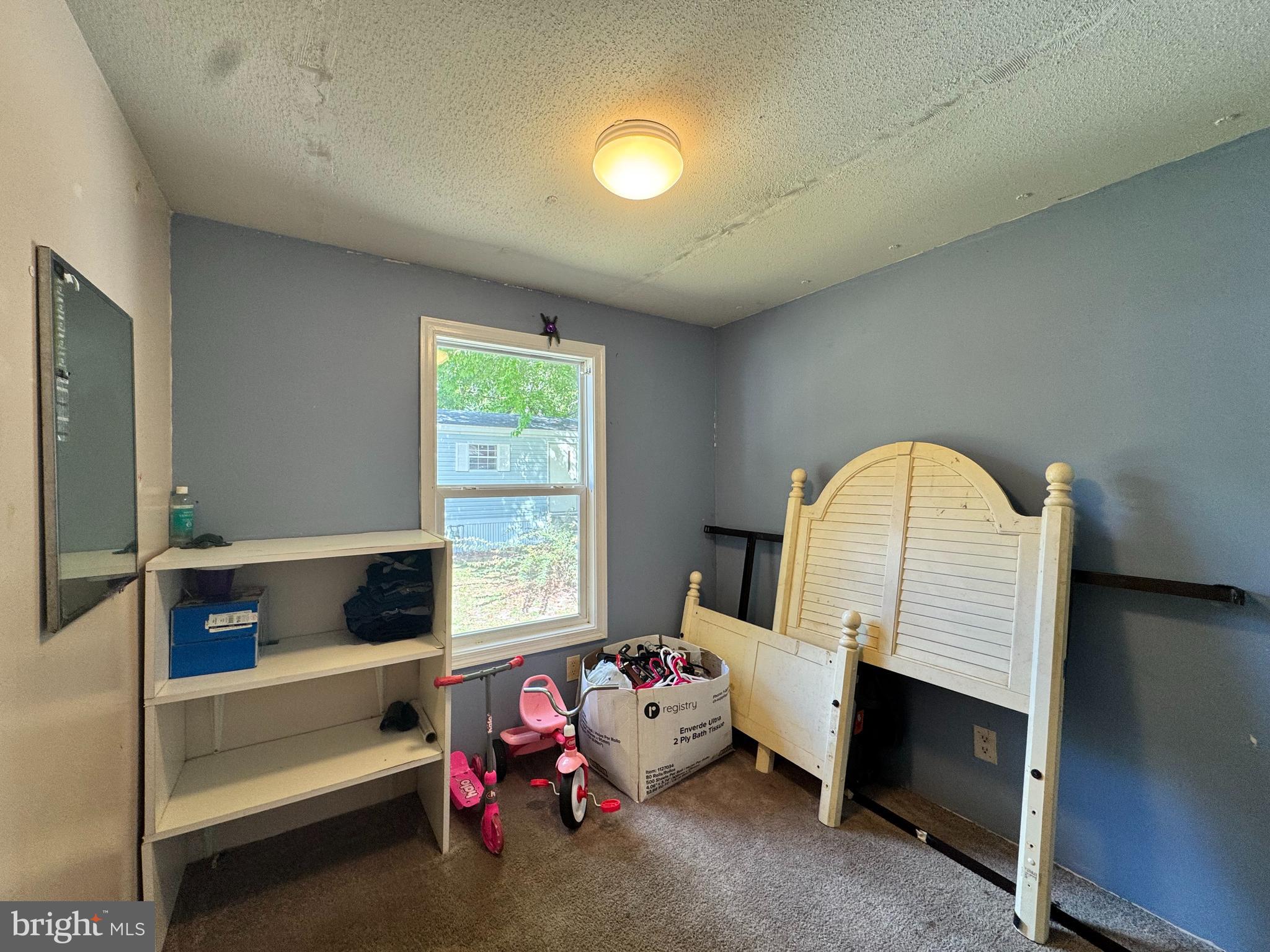 229 Sand Castle Boulevard Fruitland, MD 21826 - Photo 20 of 27 a living room with furniture and a window