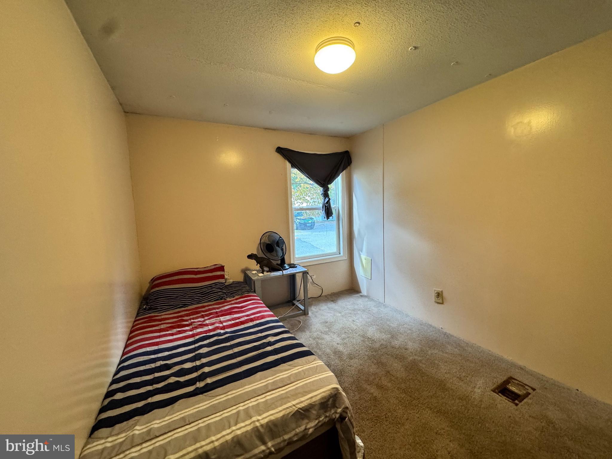 229 Sand Castle Boulevard Fruitland, MD 21826 - Photo 24 of 27 a bedroom with bed and a window