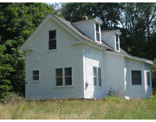 front view of house with a yard