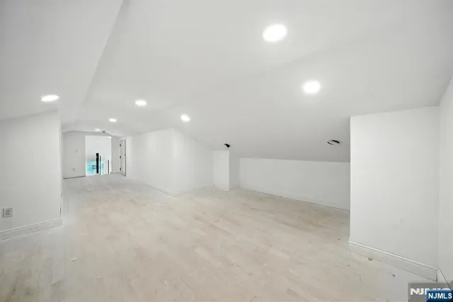 a picture of a bathroom with a shower