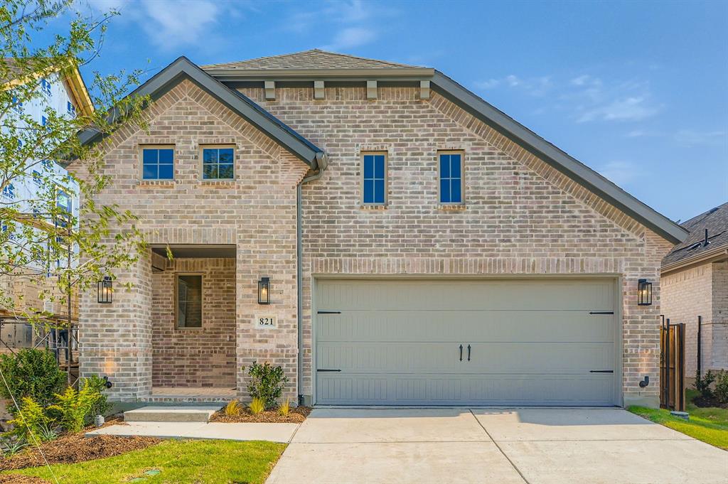 821 Trailing Vine Way Como, TX 75431 - Photo 1 of 1 French country home featuring driveway and brick siding