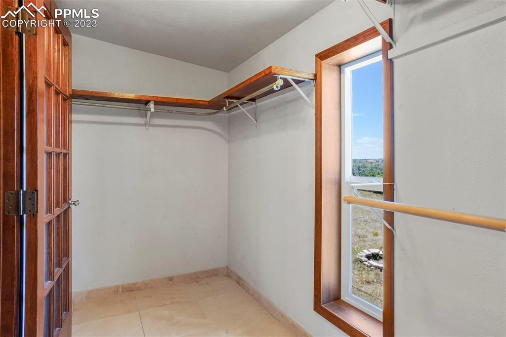 24725 Speer Road Calhan, CO 80808 - Photo 25 of 48 a view of walk in closet