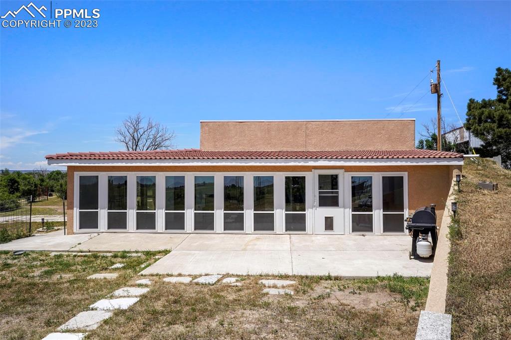 24725 Speer Road Calhan, CO 80808 - Photo 32 of 48 a view of a house with a yard