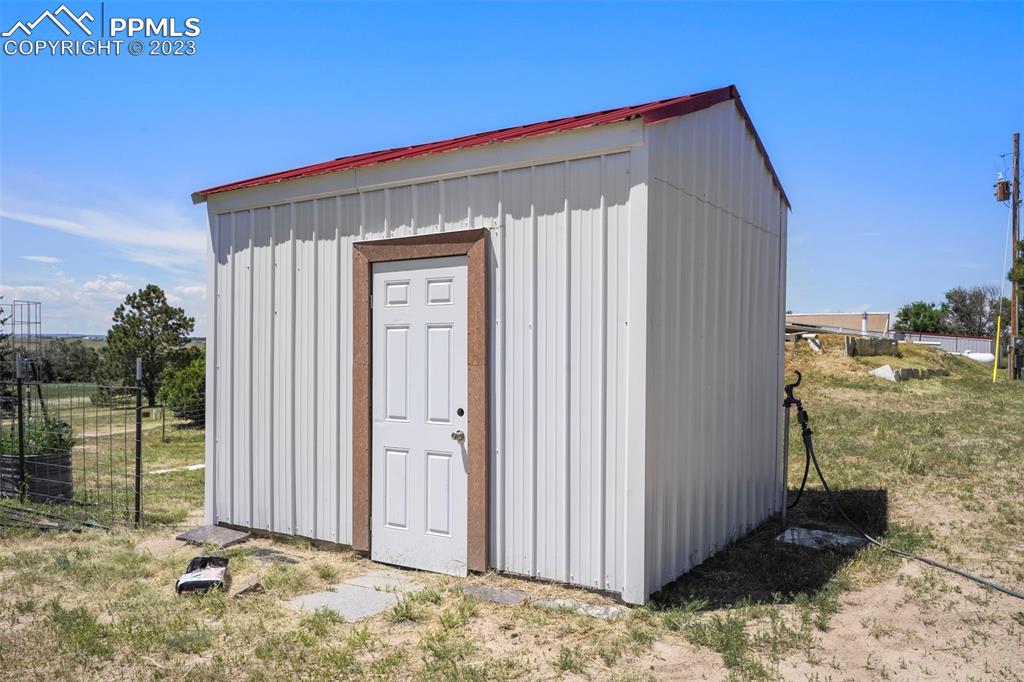 24725 Speer Road Calhan, CO 80808 - Photo 33 of 48 a view of a house with backyard