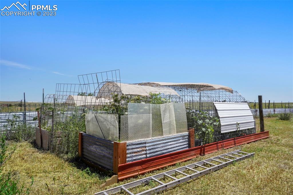 24725 Speer Road Calhan, CO 80808 - Photo 34 of 48 a balcony with view of outdoor space