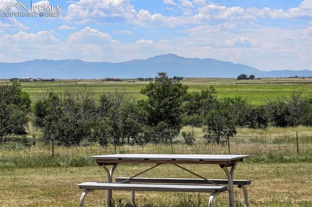 a view of a lake with a mountain in the background