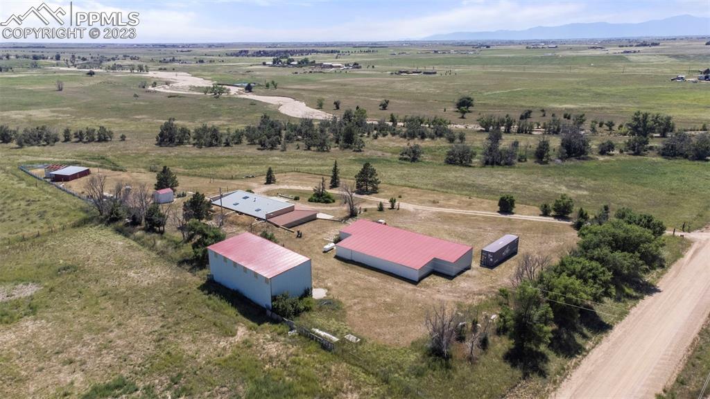 24725 Speer Road Calhan, CO 80808 - Photo 44 of 48 a view of a lake with couches and city view