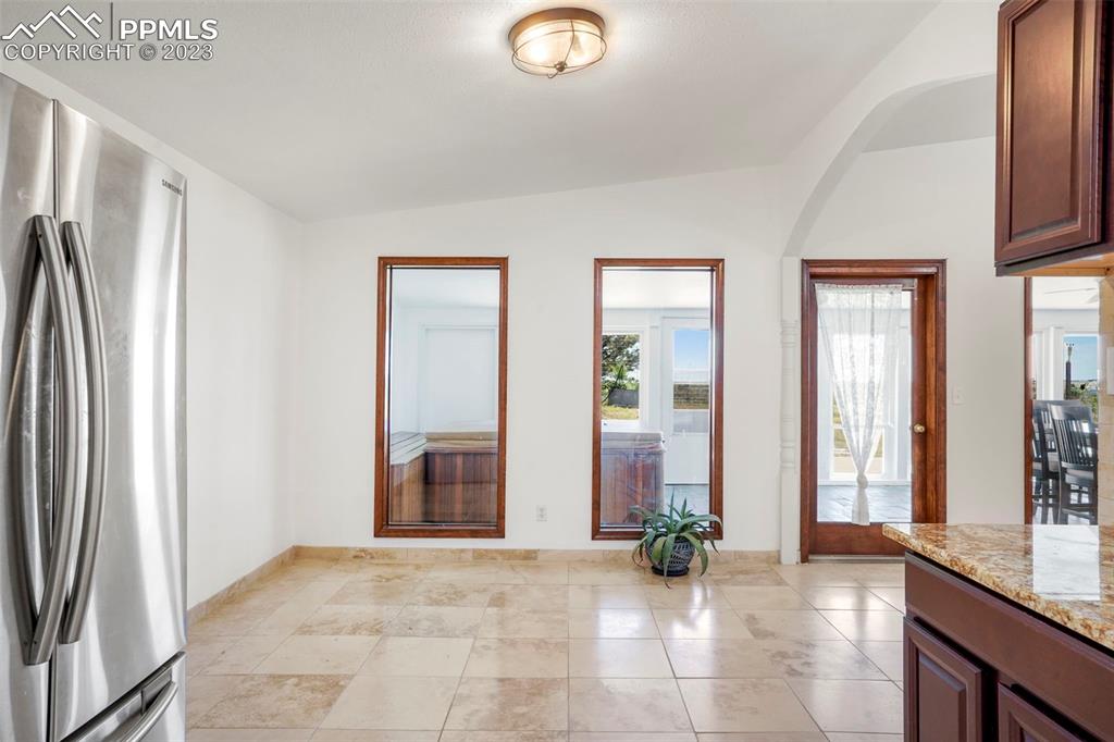 24725 Speer Road Calhan, CO 80808 - Photo 7 of 48 a view of an entryway with wooden floor