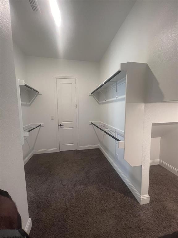 6825 Entwistle Road Frisco, TX 75034 - Photo 11 of 33 a view of an empty room with a ceiling fan