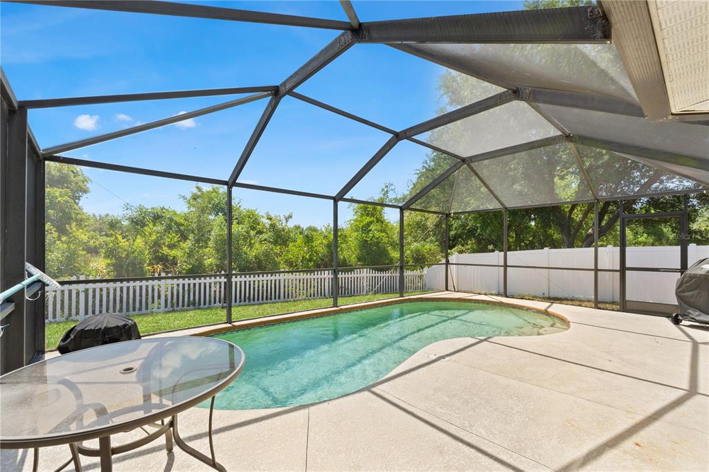 12310 Boot Spur Way Spring Hill, FL 34610 - Photo 19 of 36 a house view with a outdoor space