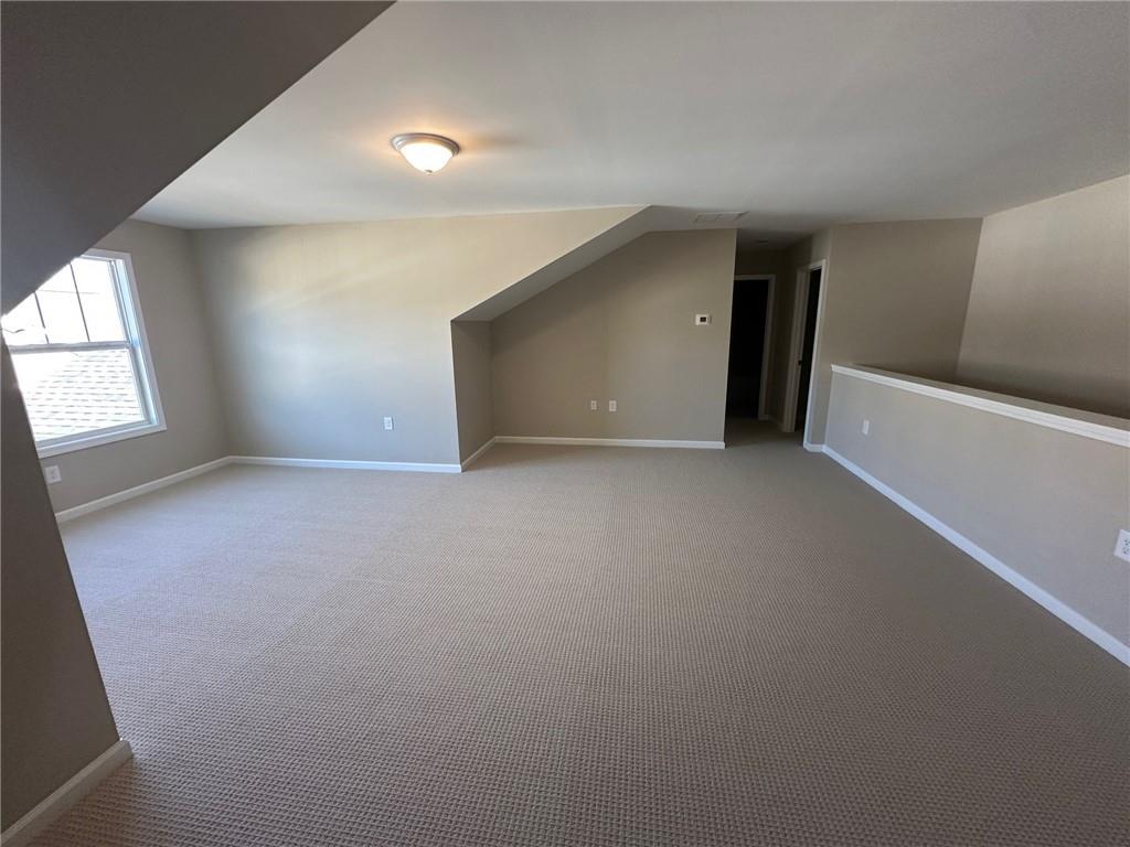 1001 Calypso Way, Unit 1001 Cumming, GA 30040 - Photo 20 of 27 an empty room with windows
