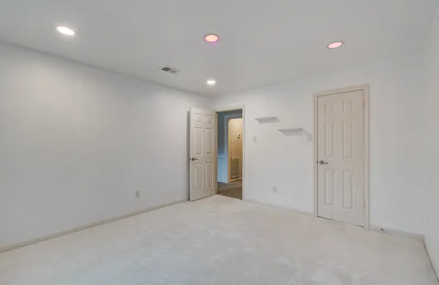 an empty room with an entryway