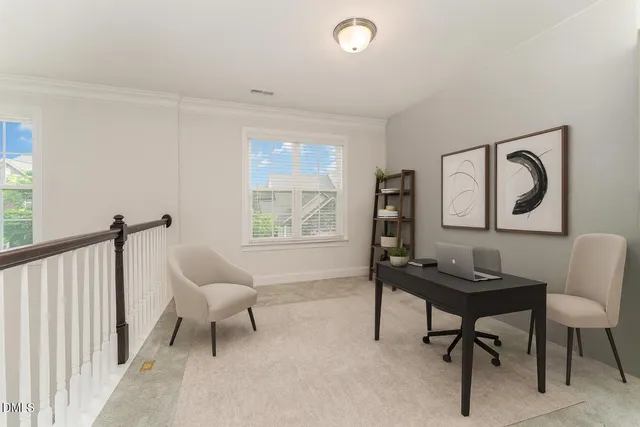 a bedroom with a bed and a mirror on dresser