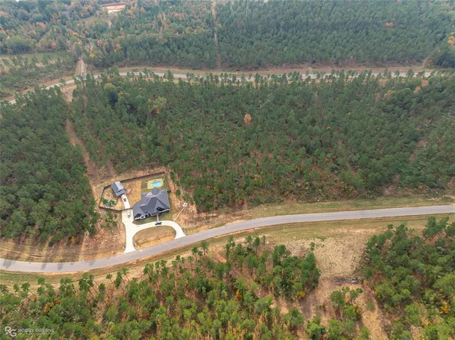 a view of lake with green space