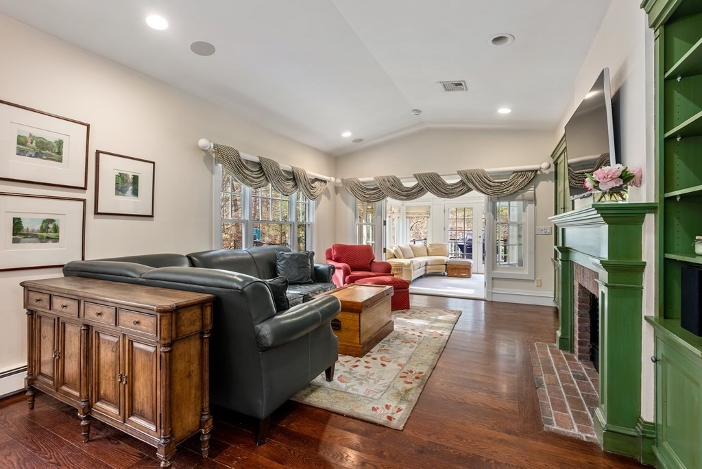 26 Robin Road Weston, MA 02493 - Photo 13 of 42 a living room with furniture and a flat screen tv