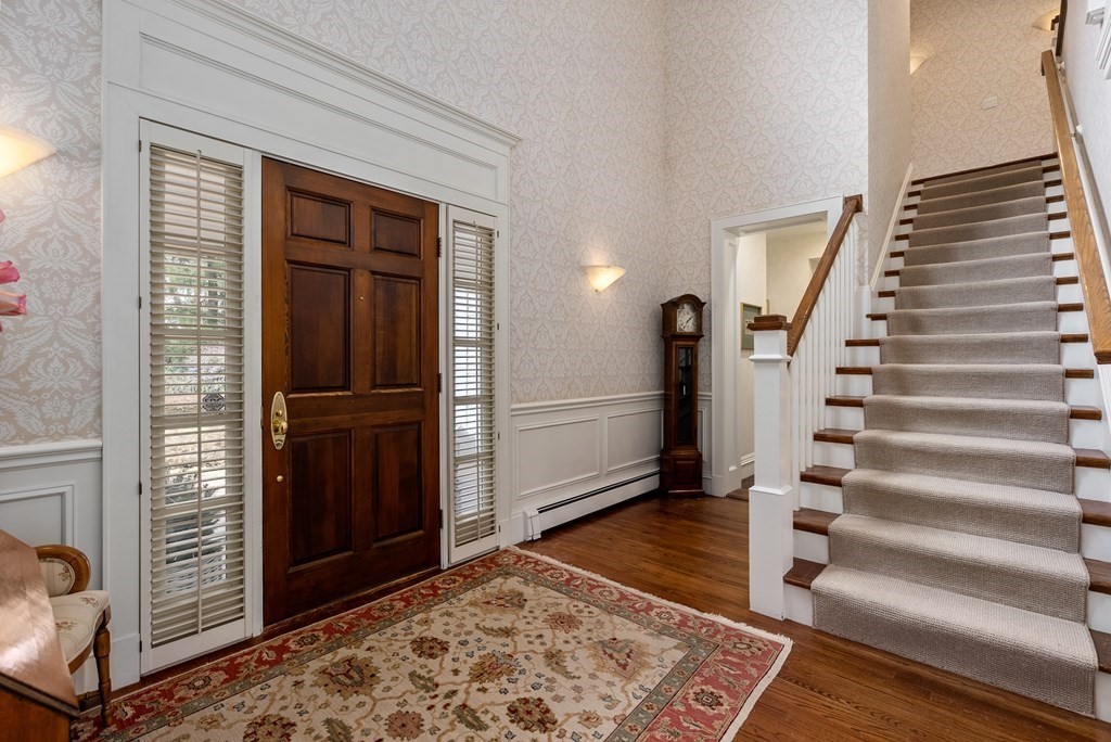 26 Robin Road Weston, MA 02493 - Photo 2 of 42 a view of an entryway with wooden floor