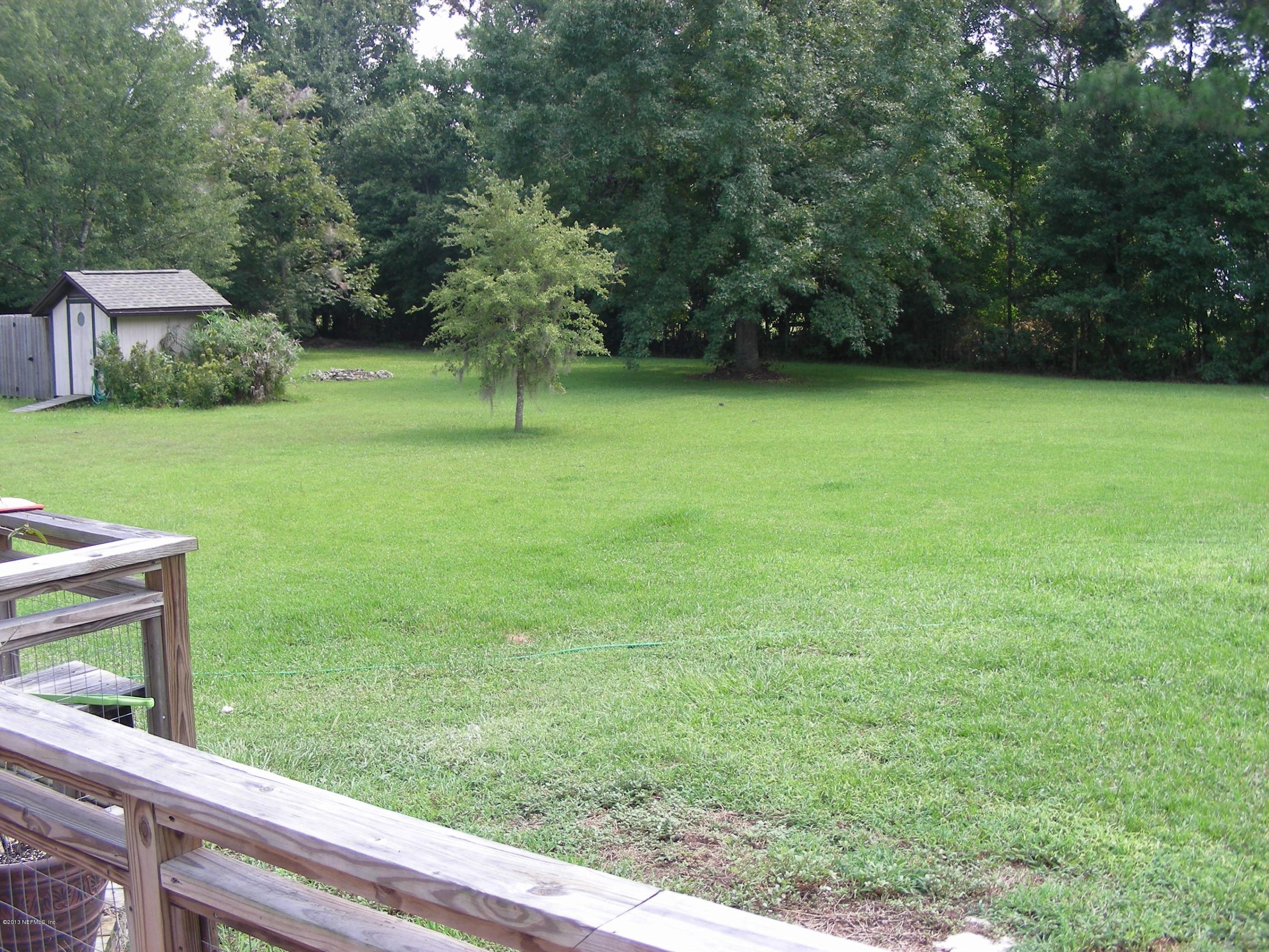 8904 Alligators Road Jacksonville, FL 32219 - Photo 17 of 20 Left side back yard pump house
