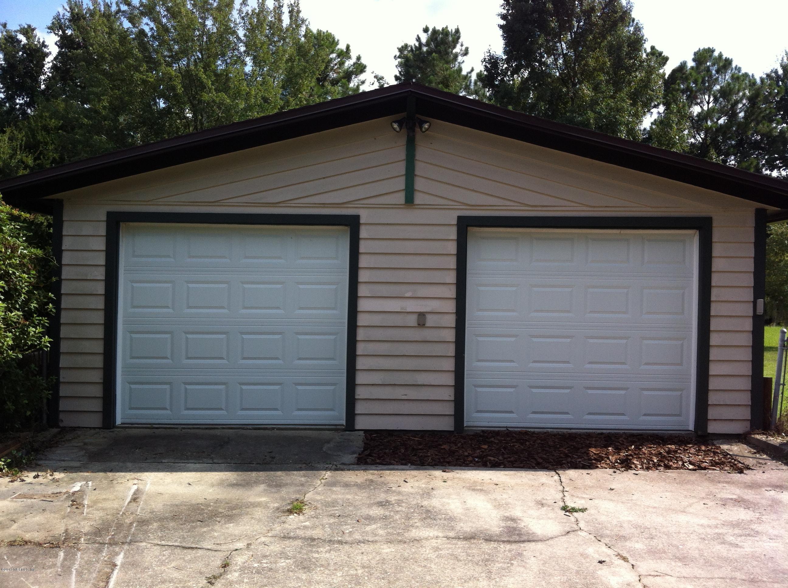 8904 Alligators Road Jacksonville, FL 32219 - Photo 20 of 20 2 car garage with newer doors
