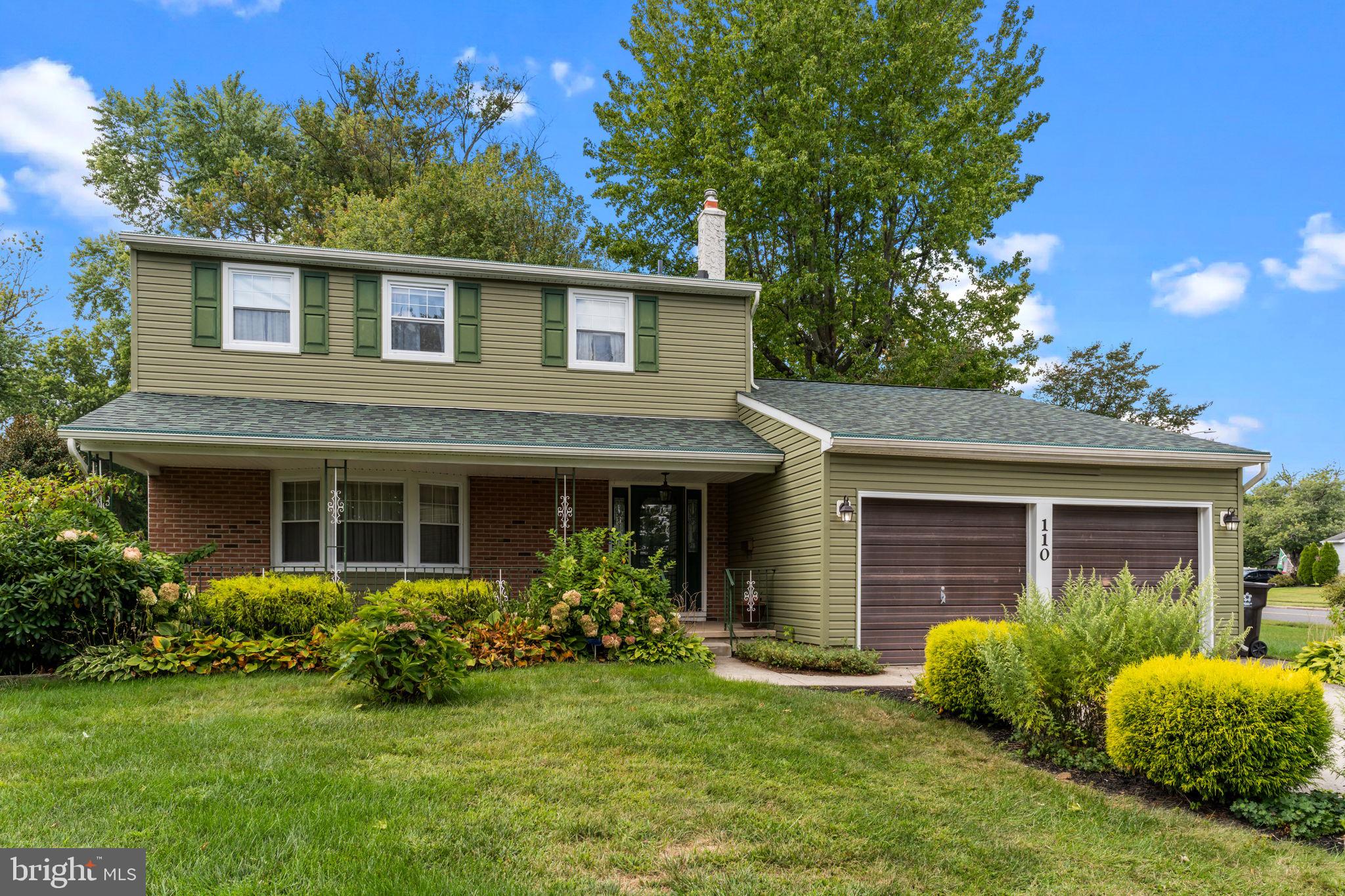 110 Linda Avenue Delran, NJ 08075 - Photo 1 of 26 a front view of a house with a yard and garage