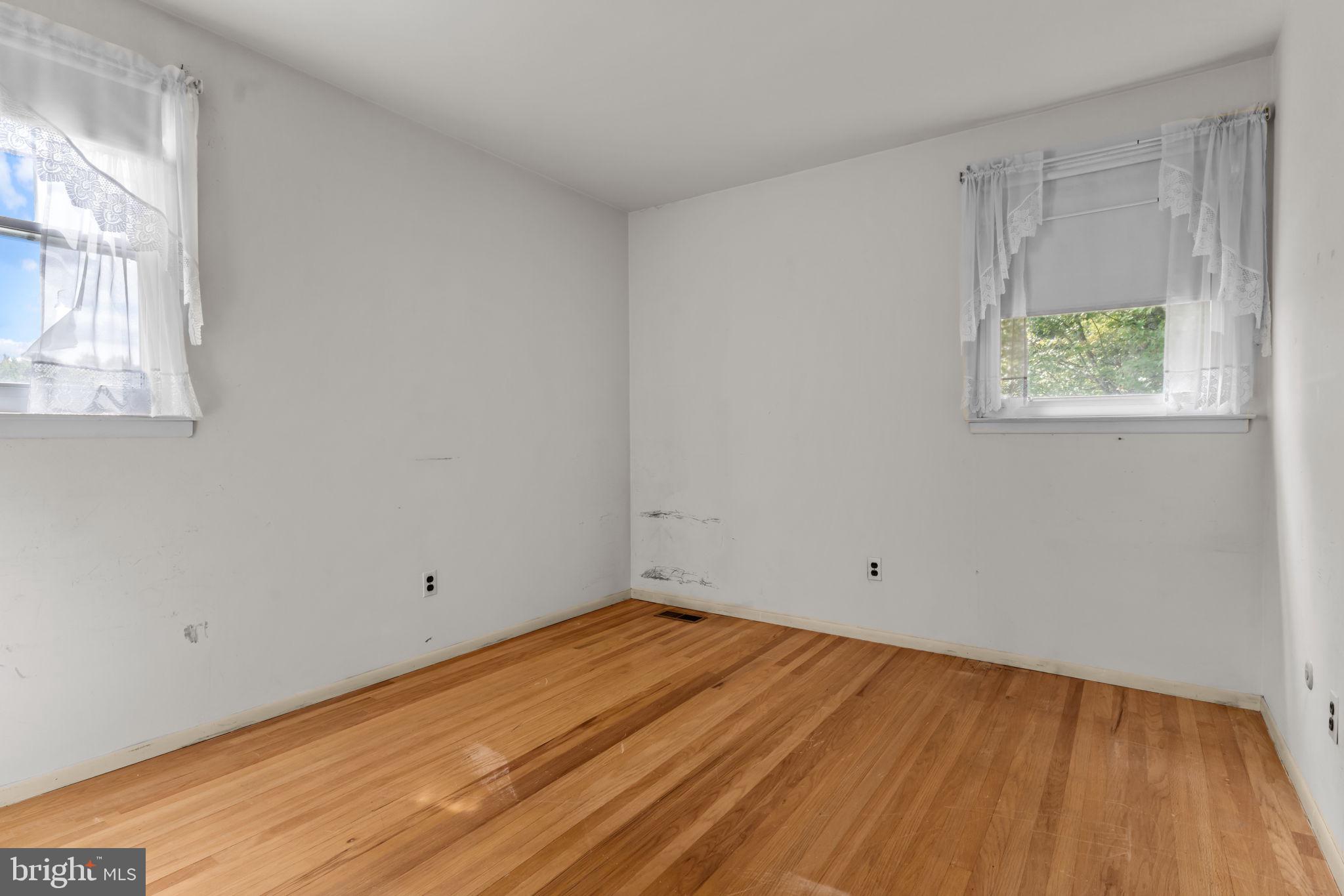 110 Linda Avenue Delran, NJ 08075 - Photo 18 of 26 a view of a room with wooden floor and windows
