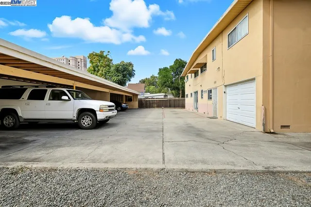 a view of a car parked in front of a house