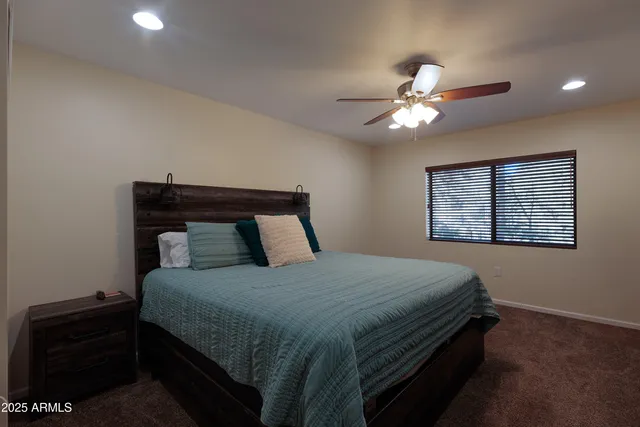 a view of street with large trees