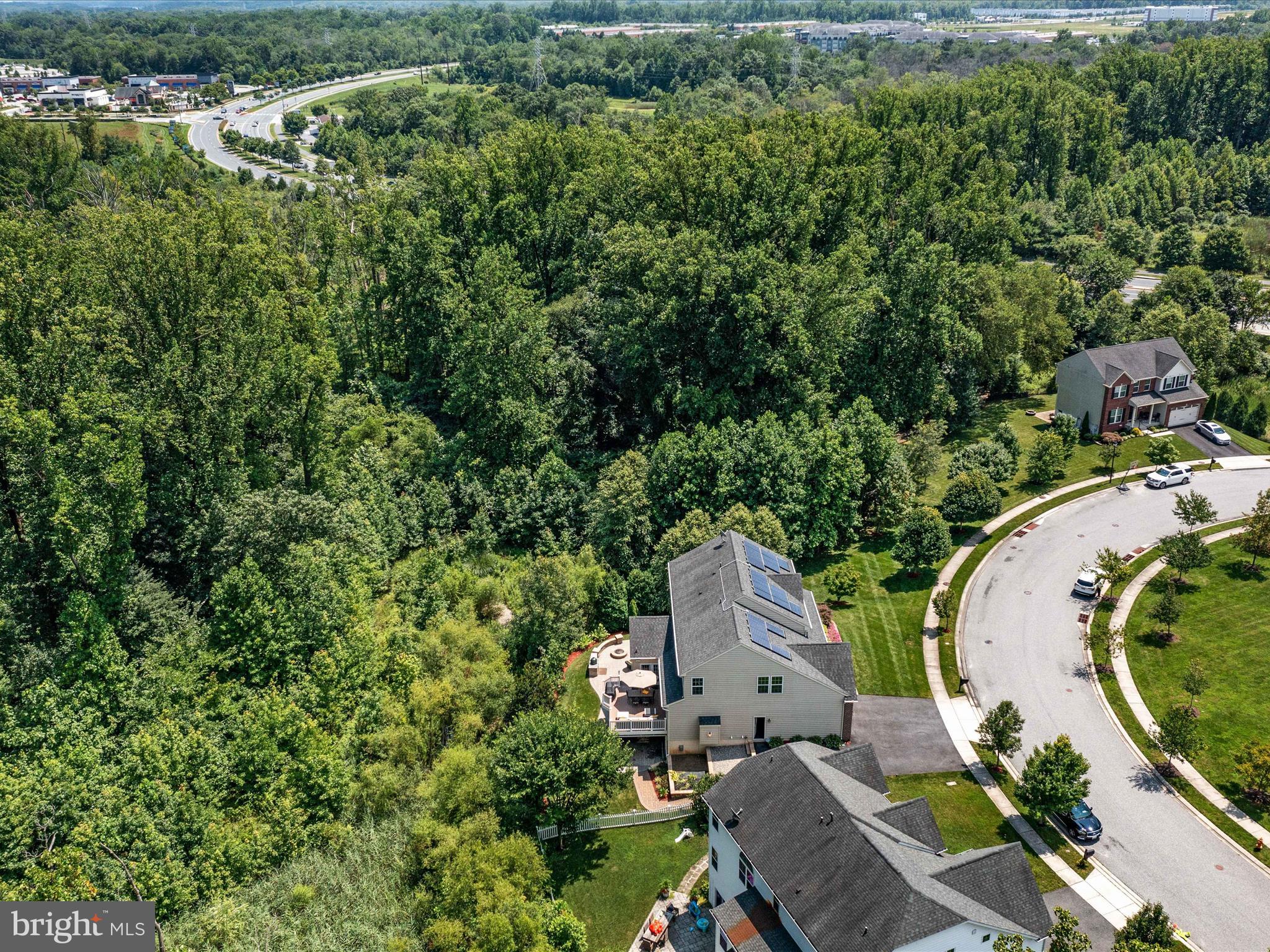 10518 Windlass Run Road Baltimore, MD 21220 - Photo 27 of 71 an aerial view of a house with a yard and lake view